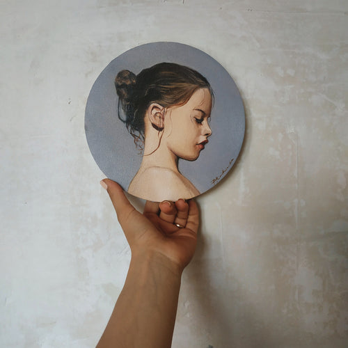 Oil portrait on a round canvas (painted from a photograph) - About Face Illustration